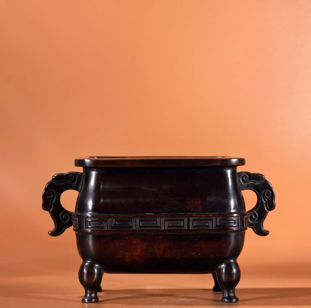 Fine bronze incense burner: This exquisite bronze incense burner is 12.6 cm high, with a mouth diameter of 13.6 cm and 10 cm, and weighs 2635 grams. Provenance:Private collection from a professor in Yale University. Our dedicate