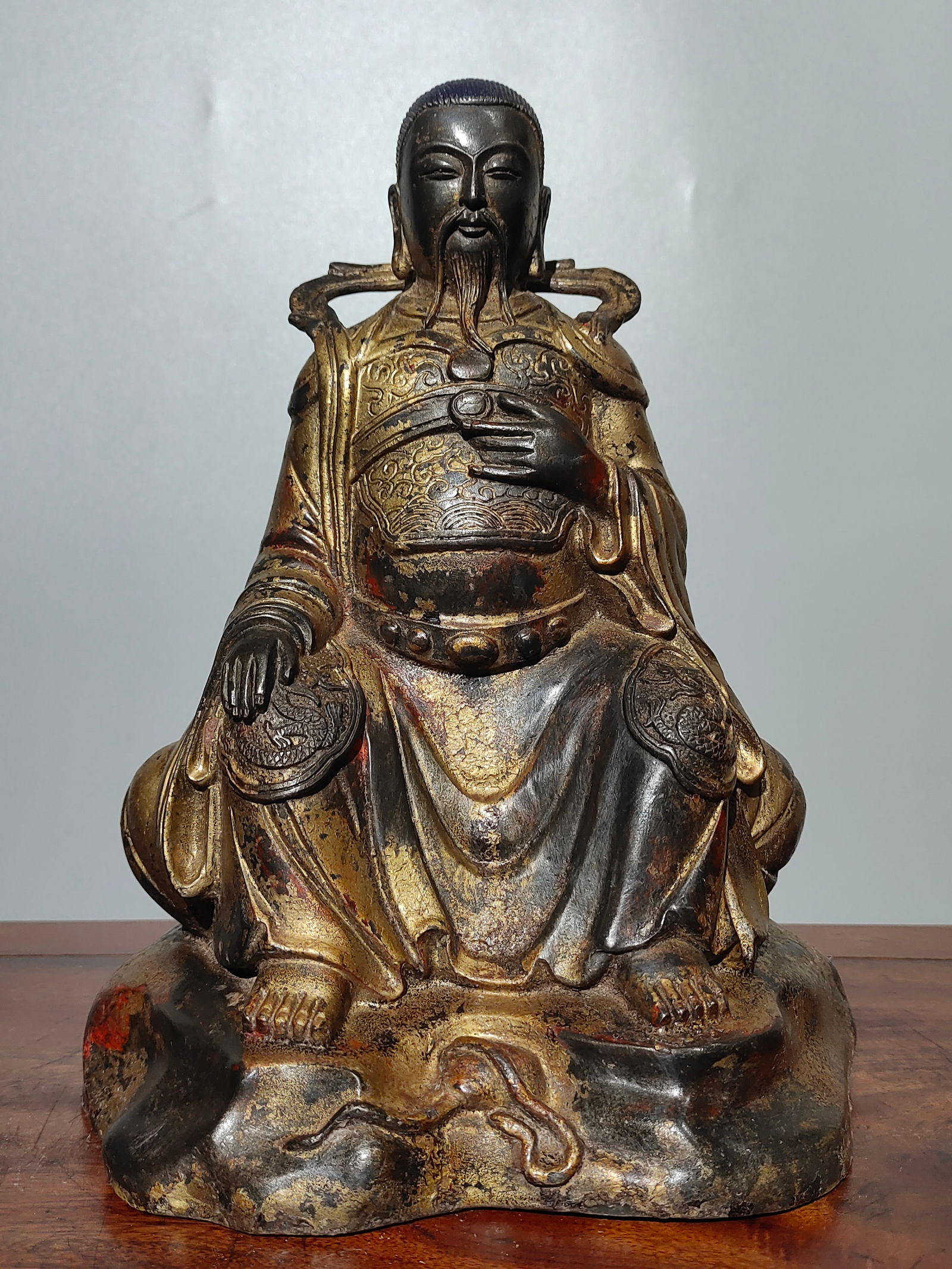 A pure copper gilt Buddha statue of Zhenwu the Great, formerly in the collection. (1 of 9)