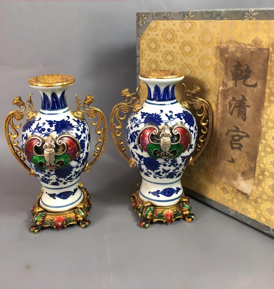 A rare Qing Dynasty Qianlong period cloisonne enamel and gold-plated blue and white porcelain vase (1 of 9)