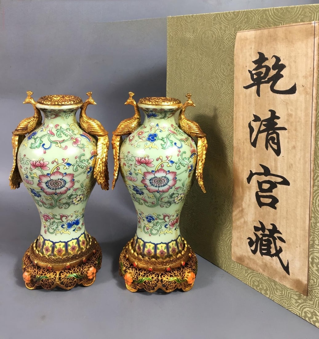 A rare Qing Dynasty cloisonne enamel vase with gold-plated floral design.: A rare collectible, a Qing dynasty cloisonne enamel vase with gold-plated floral design, 4x9x18cm. Provenance:Mr.Jordi, Northern Virginia. Our dedicated team expertly handles both domestic and global