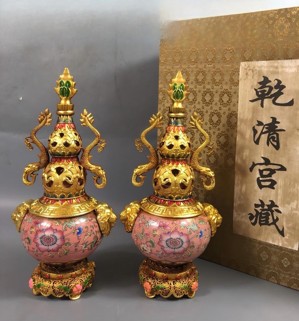 A rare Qing Dynasty Qianlong period cloisonne enamel vase with gold-plated floral design.: A rare collectible, a Qing Dynasty Qianlong period cloisonne enamel vase with gold-plated floral design, 12 x 26 cm. Provenance:Mr.Jordi, Northern Virginia. Our dedicated team expertly handles both do