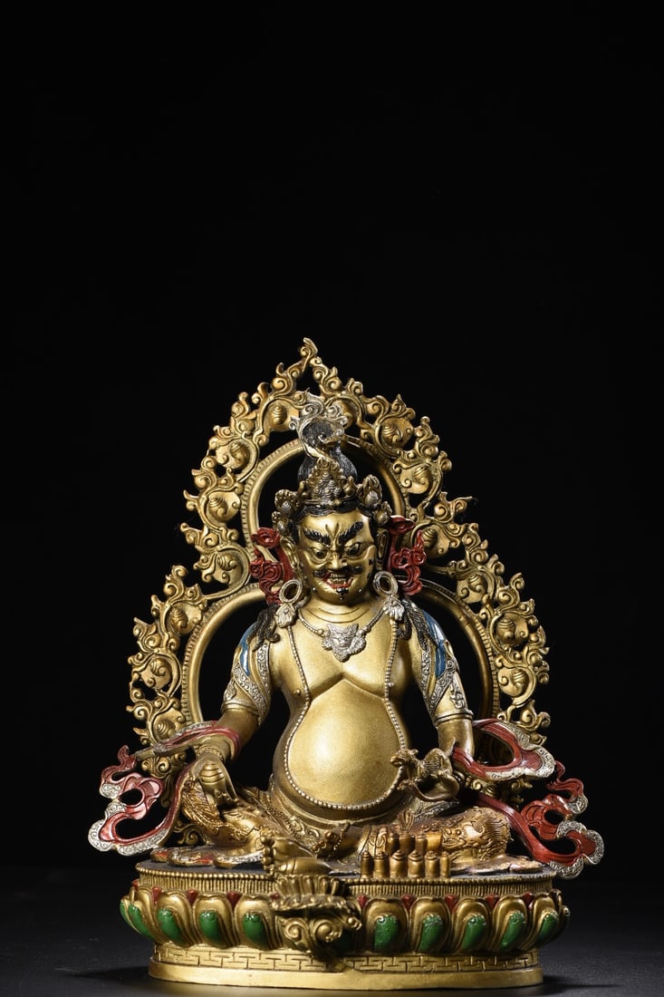 Copper Painted Yellow Jambhala Statue: A painted bronze statue of the Yellow God of Wealth, measuring 30cm in height, 24cm in width, and 16cm in thickness, weighing 2305 grams. Provenance:Private collection, Connecticut. Our dedicated team