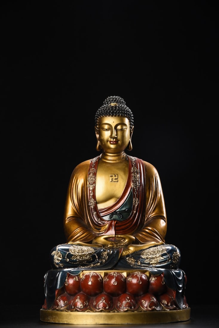Copper-painted Shakyamuni Buddha statue: A bronze painted Shakyamuni Buddha statue, 40cm high, 26cm wide, and weighing 5225 grams. Provenance:Mrs. Amily, Washington, DC. Our dedicated team expertly handles both domestic and global shipping a
