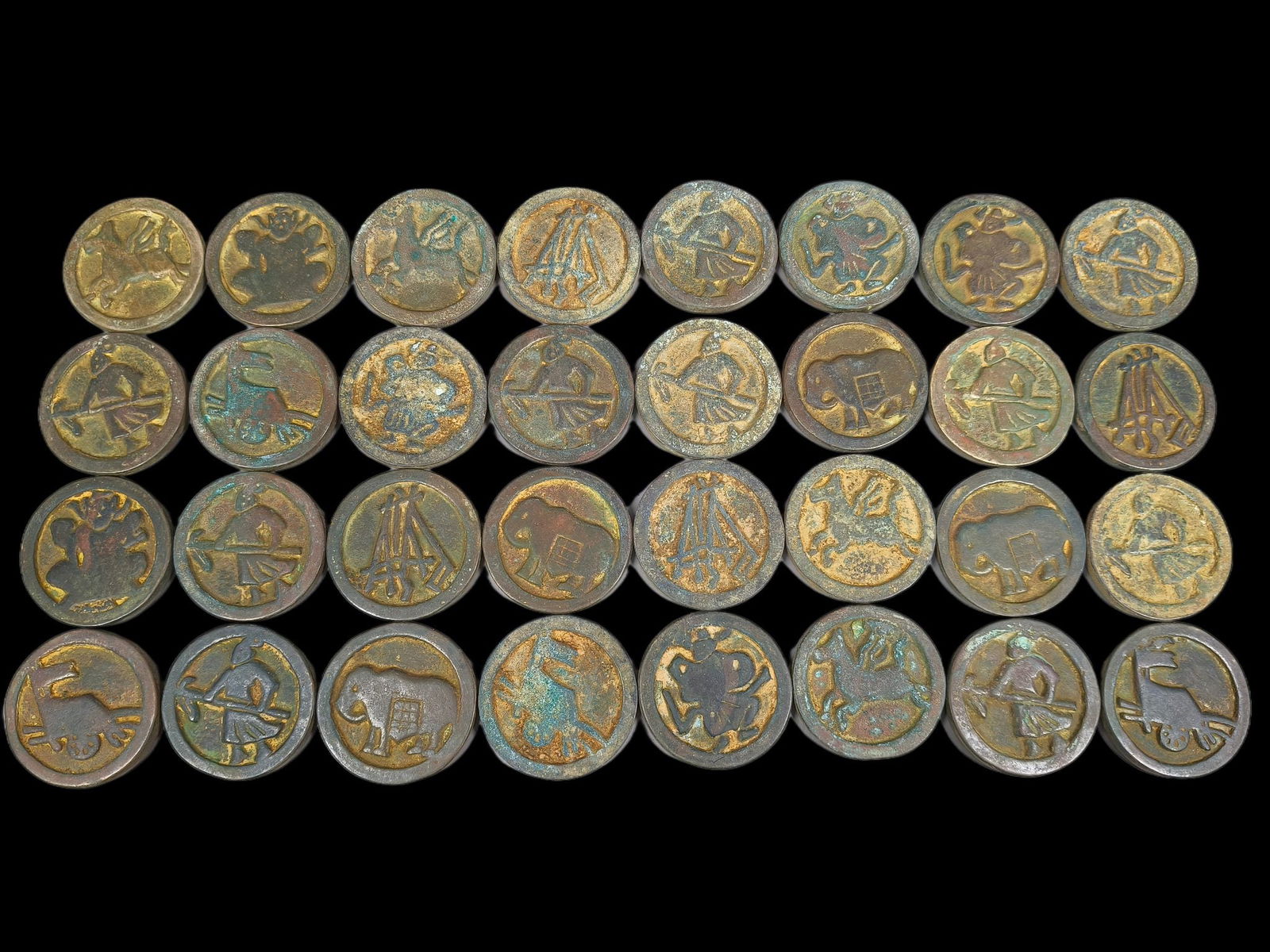 A set of rare bronze chess pieces: A treasured bronze elephant from the collection, 4.8 cm in diameter, 0.5 cm thick, and weighing 1764 grams. Provenance:Mrs. Amily, Washington, DC. Our dedicated team expertly handles both domestic