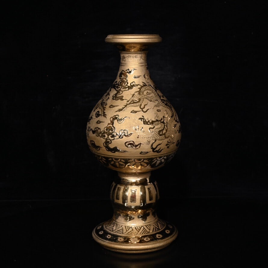 Gilded Dragon Candlestick from the Xuande Period of the Ming Dynasty: A gilt dragon-patterned candlestick from the Xuande period of the Ming Dynasty, 23 x 11 cm, 200 g. Provenance:Private collection of the retired lawyer Mr.Henry, Chelmsford, Massachusetts. Our