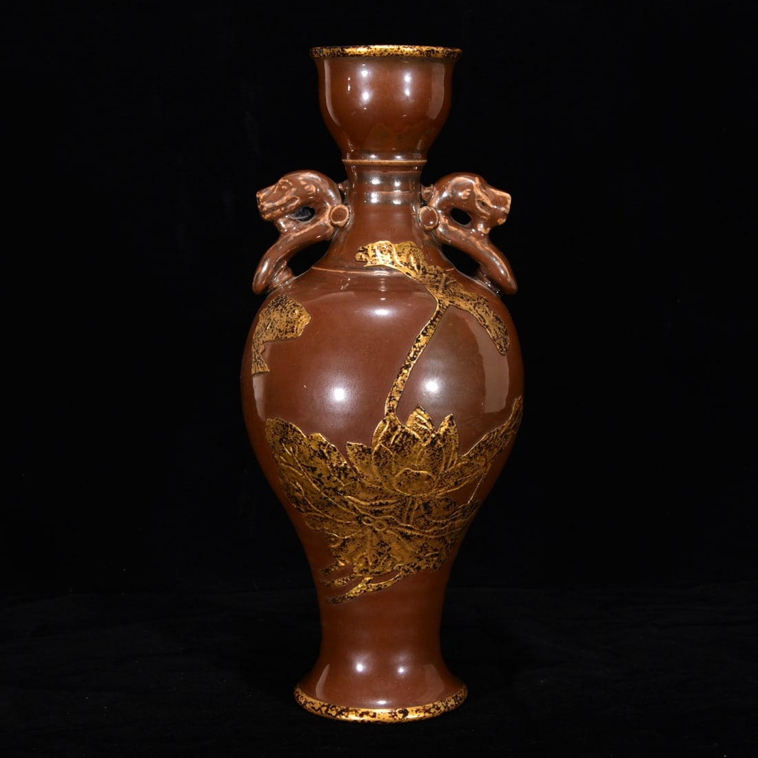 Song Dynasty Ding Ware Purple-Gold Glazed Double-Eared Vase with Garnet-Inlaid Mouth: A Song Dynasty Ding ware vase with a purple-gold glaze, a rim inlaid with gold, and two handles; 32 cm high and 13 cm in diameter. Provenance:Private collection of the retired lawyer Mr.Henry,