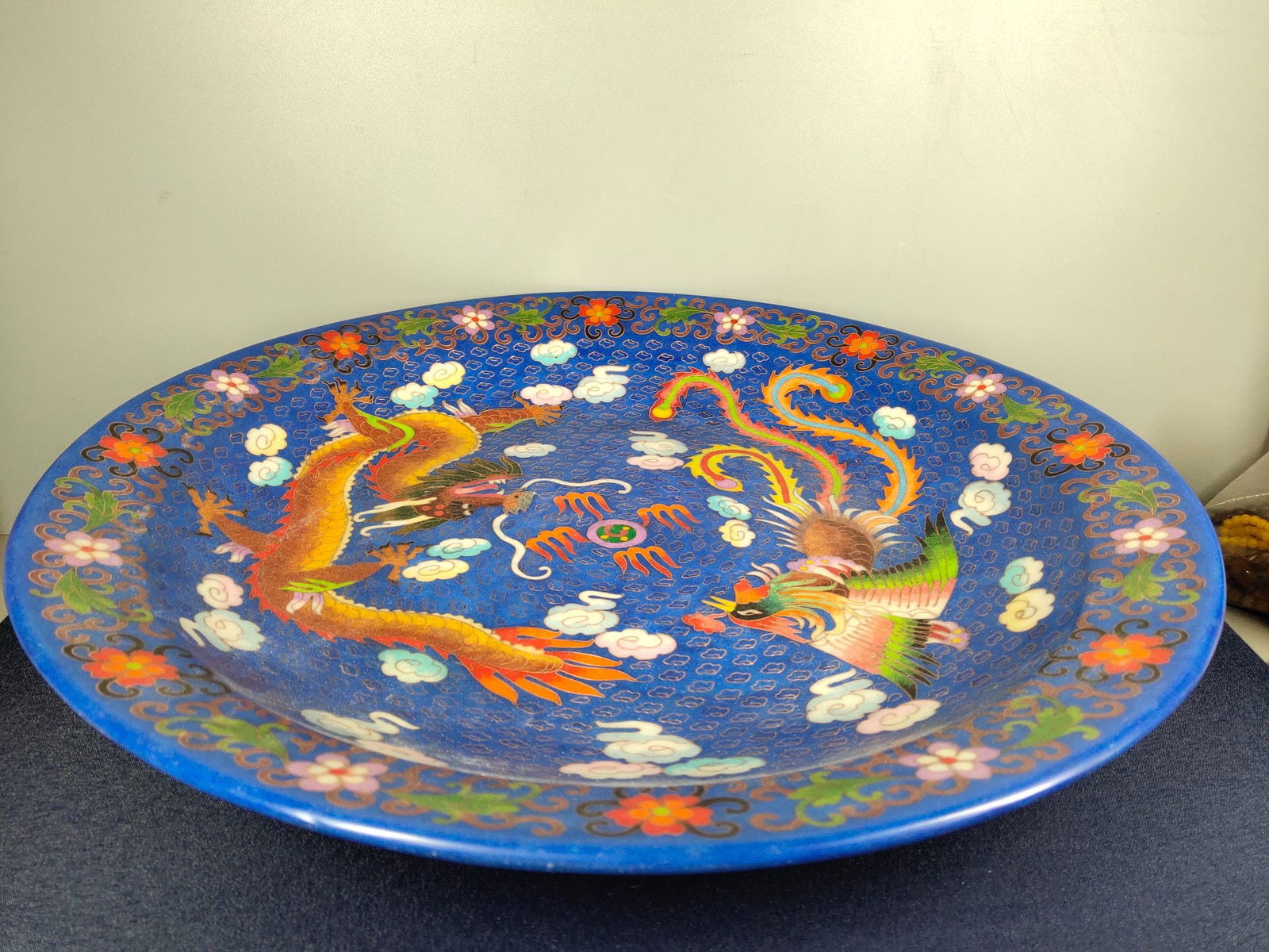 A treasured Ming Dynasty Chenghua period cloisonne enamel plate with dragon and phoenix design. (1 of 9)