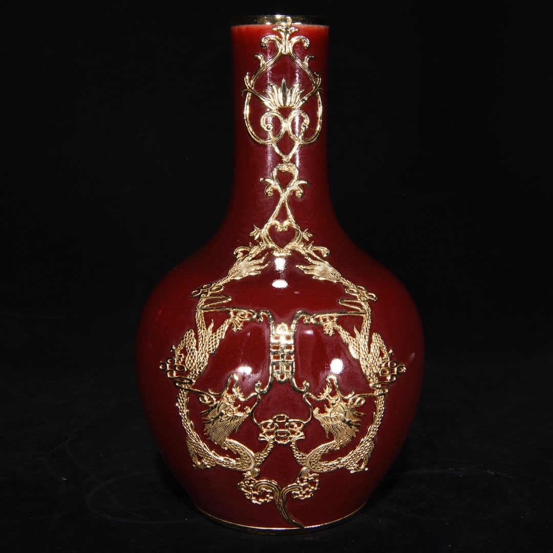 A Qianlong period gilt bronze red-glazed celestial globe vase: A Qing Dynasty Qianlong period gilt bronze red-glazed celestial globe vase, 24 x 15 cm. Provenance:Private collection, Vancouver, Canada. Our dedicated team expertly handles both domestic and global