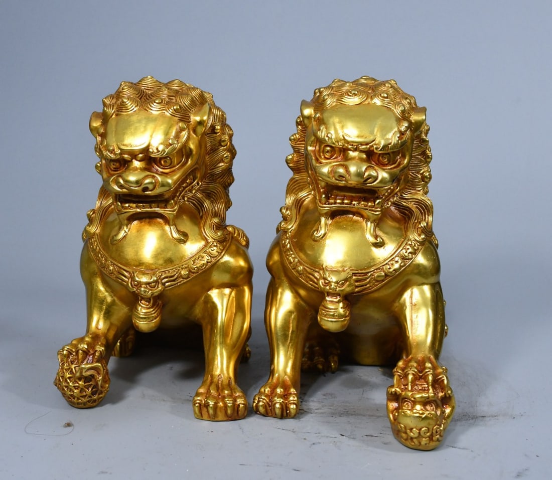 A pair of gilded bronze lions for warding off evil spirits (1 of 9)