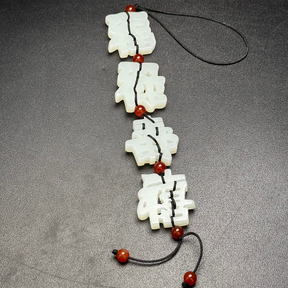 Exquisite Hetian jade with auspicious symbols of fortune, prosperity, longevity, and happiness. (1 of 9)