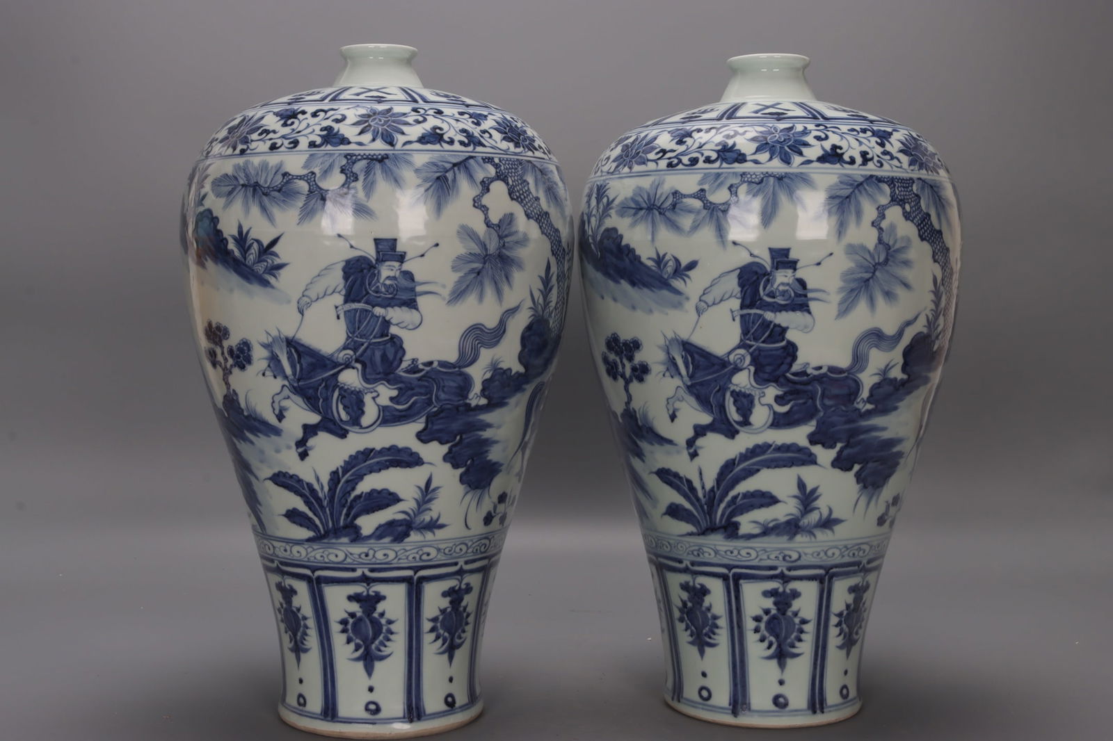 A pair of Yuan Dynasty blue and white porcelain plum vases depicting the story of Xiao He chasing (1 of 9)