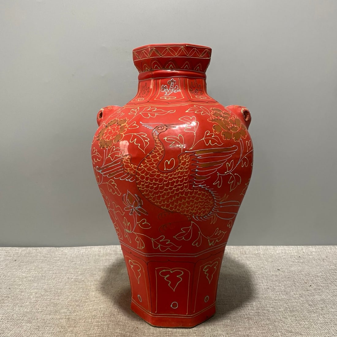 A Yuan dynasty red-glazed phoenix and animal-head vase with a frosted design, more precious than: A Yuan dynasty red-glazed phoenix and animal-head vase with a frosted design, more precious than Yuan blue and white porcelain. Provenance:Mrs. Amily, Washington, DC. Our dedicated team expertly handl