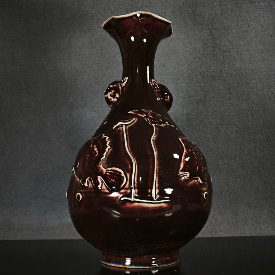 Yuan Dynasty sacrificial red glaze high relief fish and algae pattern flower-shaped bottle (1 of 7)