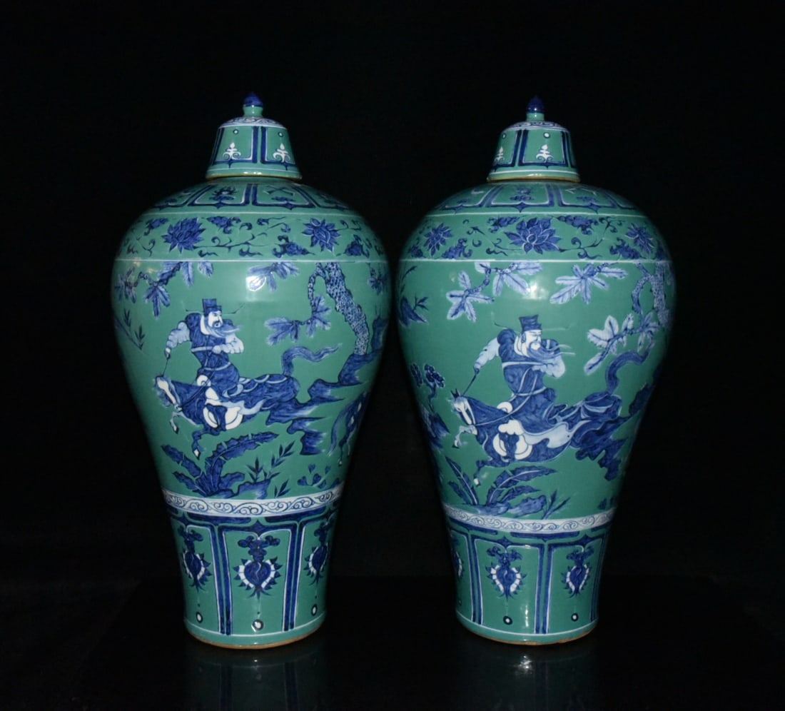 A pair of Yuan Dynasty turquoise-glazed blue-and-white plum vases depicting Xiao He chasing Han Xin. (1 of 9)