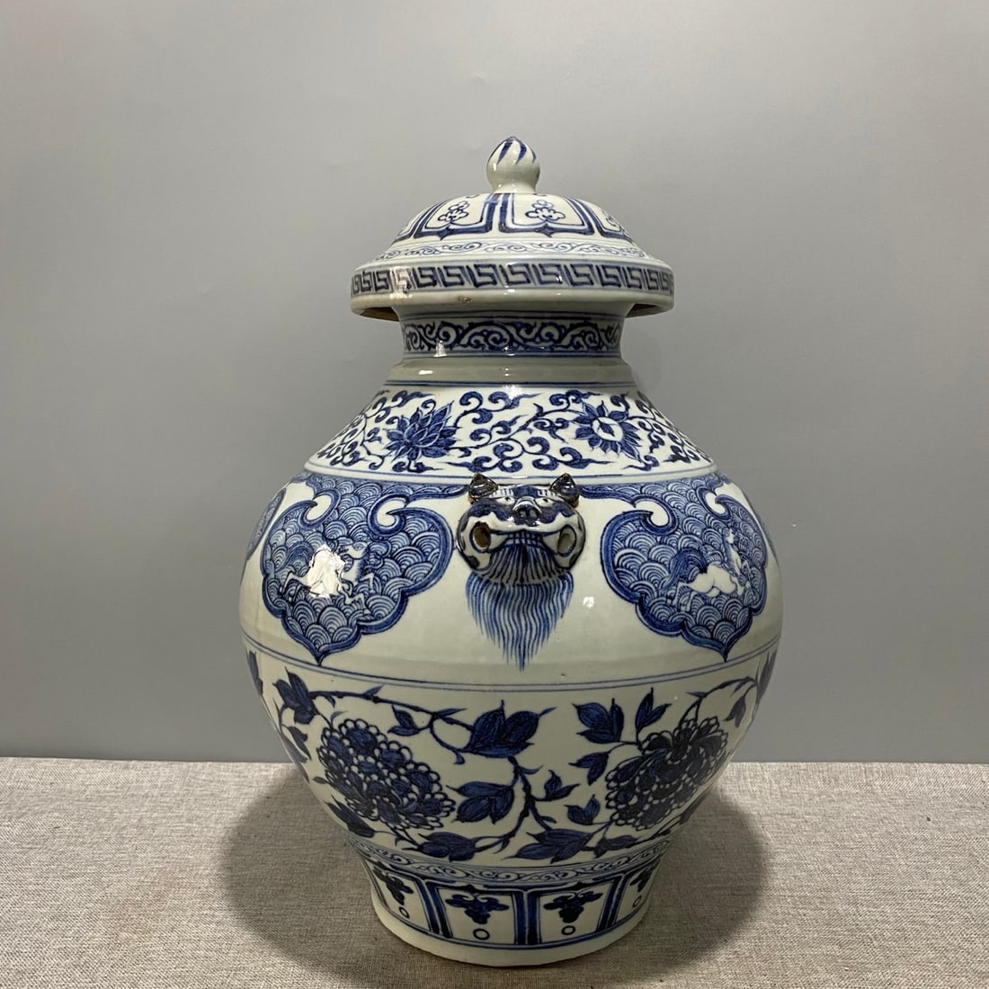 Yuan Dynasty Blue and White Porcelain Jar with Animal Head Design and Scrolling Floral Pattern (1 of 8)