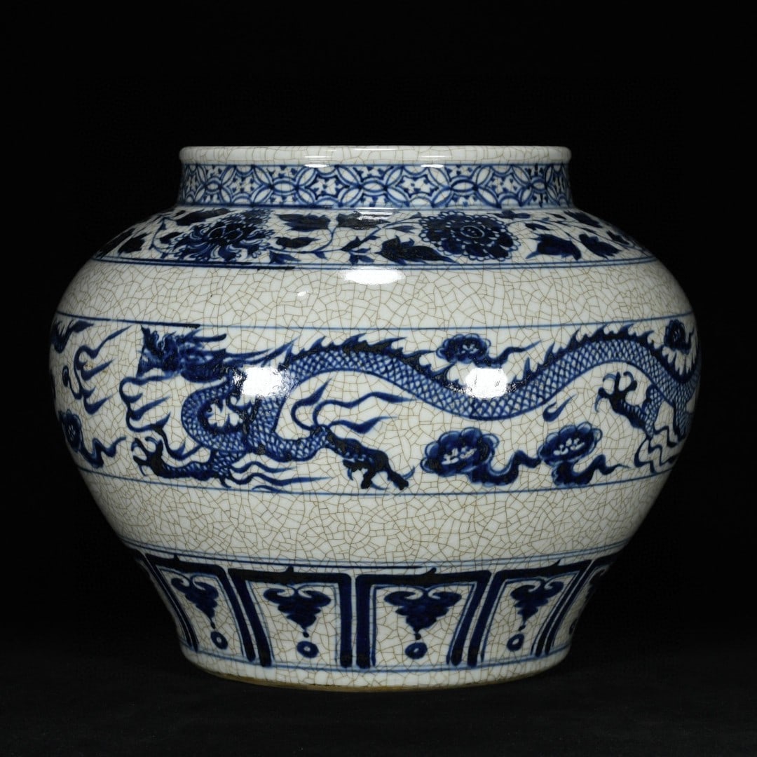 Yuan Dynasty Blue and White Porcelain Jar with Lotus and Double Dragon Design: Yuan Dynasty blue and white porcelain jar with lotus scroll and double dragon design, 28 cm high and 35 cm in diameter Provenance:Private collection of the retired lawyer Mr.Henry, Chelmsford, Massach
