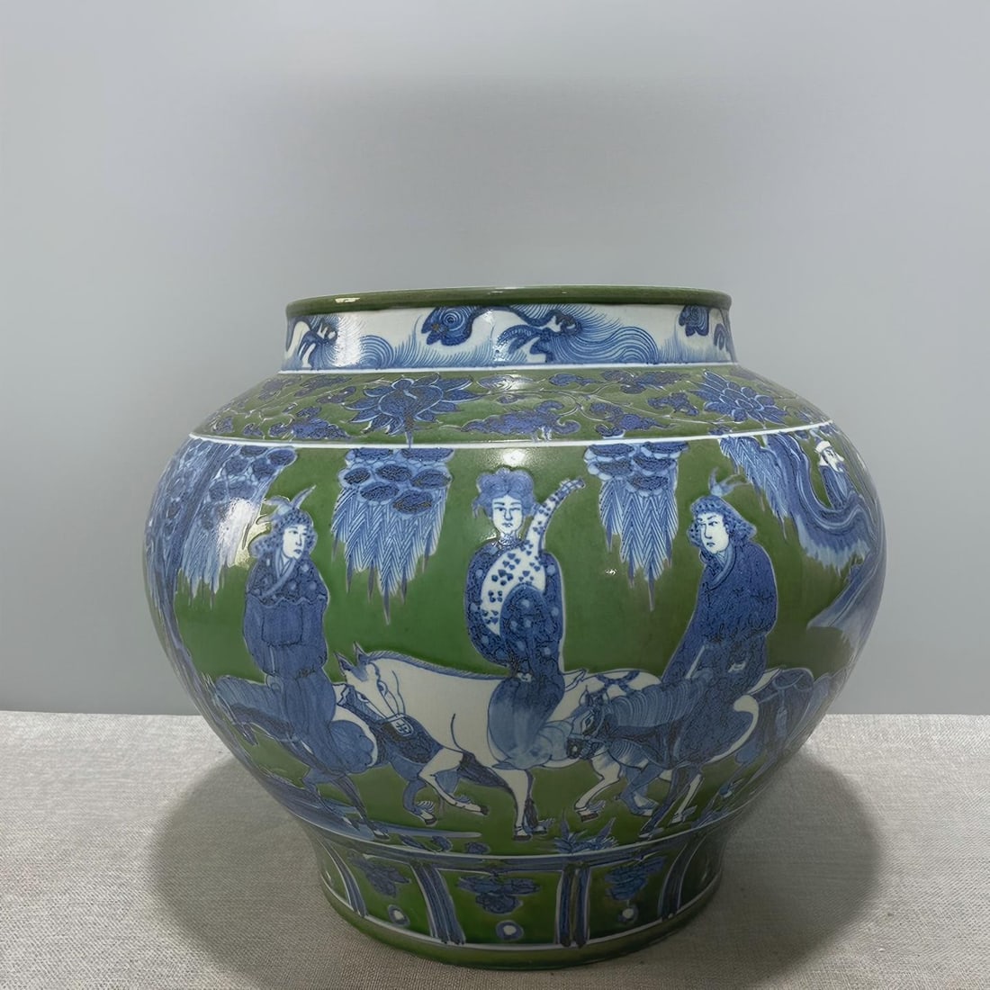 Yuan Dynasty Blue and White Green Glazed Large Jar with Zhaojun Leaving the Frontier: Yuan Dynasty Blue and White Green Glazed Large Jar with Zhaojun Leaving the Frontier Provenance:Private collection, Middletown, Rhode Island. Our dedicated team expertly handles both domestic and glob