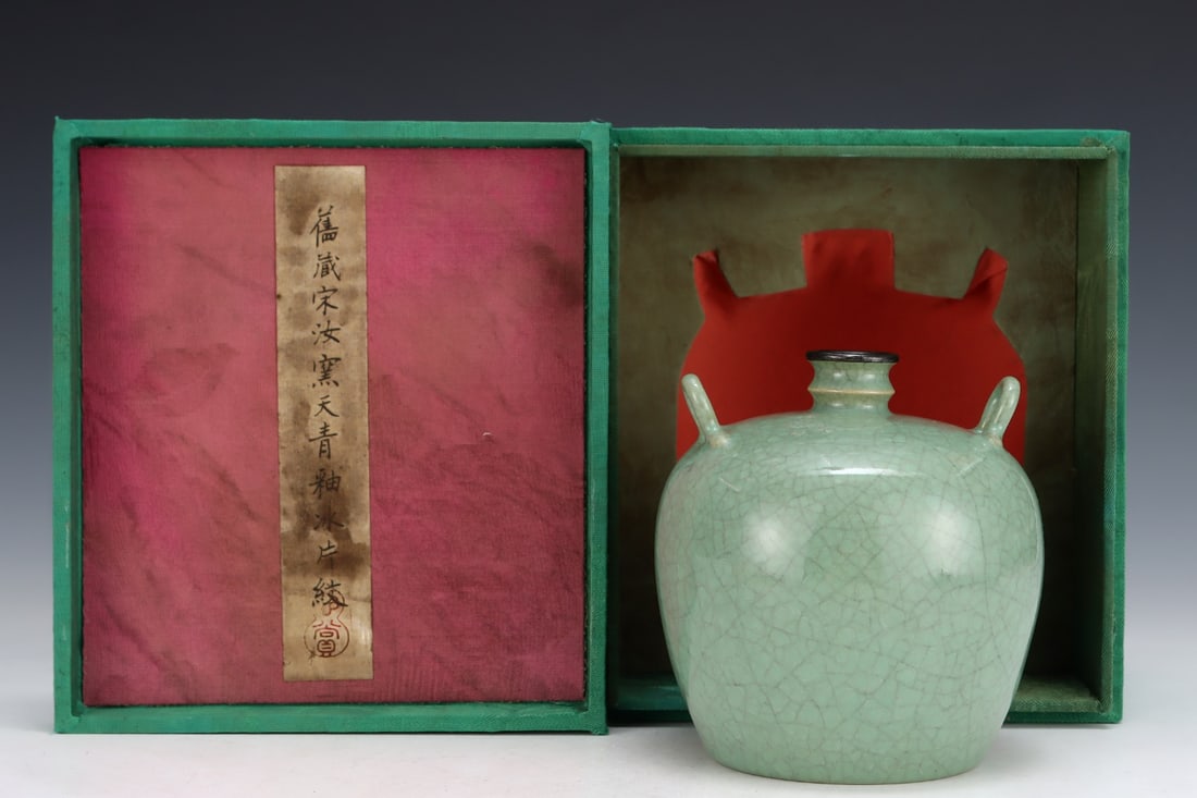 Formerly in the collection of a Song Dynasty Ru ware celadon-glazed double-handled vase with (1 of 9)
