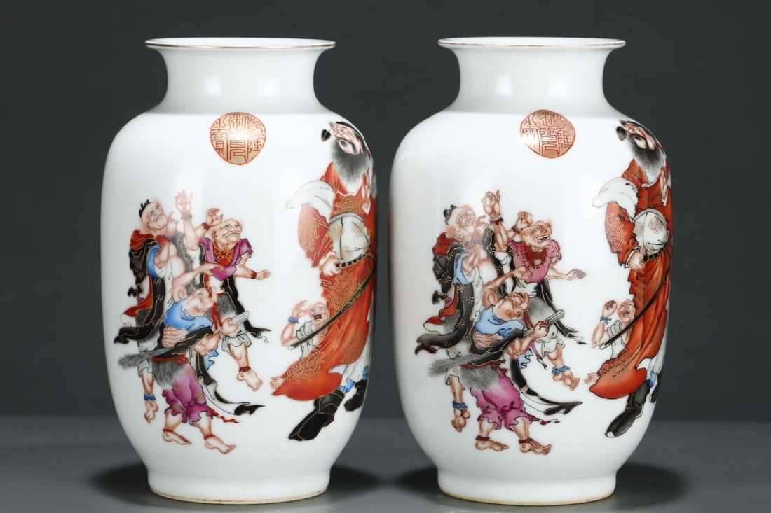 A pair of famille rose lantern vases depicting Zhong Kui catching ghosts, made during the Qianlong (1 of 9)