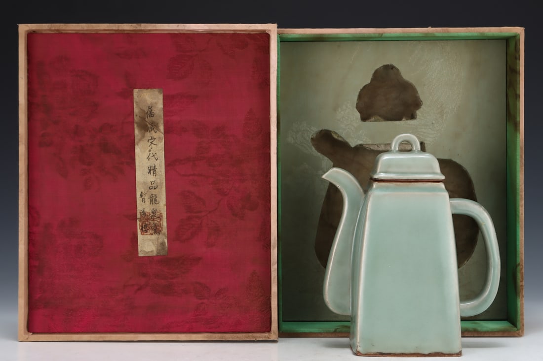 Formerly in the collection of a Song Dynasty Longquan kiln plum-green square ewer: A Song Dynasty Longquan celadon square ewer, formerly in the collection, measures 21.5 cm in height and 17.5 cm in diameter. Provenance:Mr. Stefan, Minneapolis, Minnesota. Our dedicated team expertly