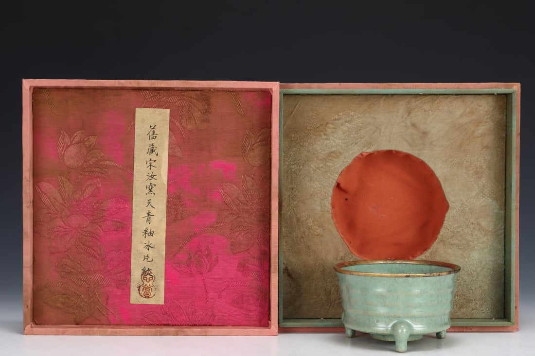 Formerly in the collection of a Song Dynasty Ru ware celadon-glazed tripod incense burner: A Song Dynasty Ru ware celadon-glazed tripod incense burner, formerly in the collection. Dimensions: Height: 6.5 cm; Diameter: 10.8 cm. Provenance:Private collection from a professor in University of