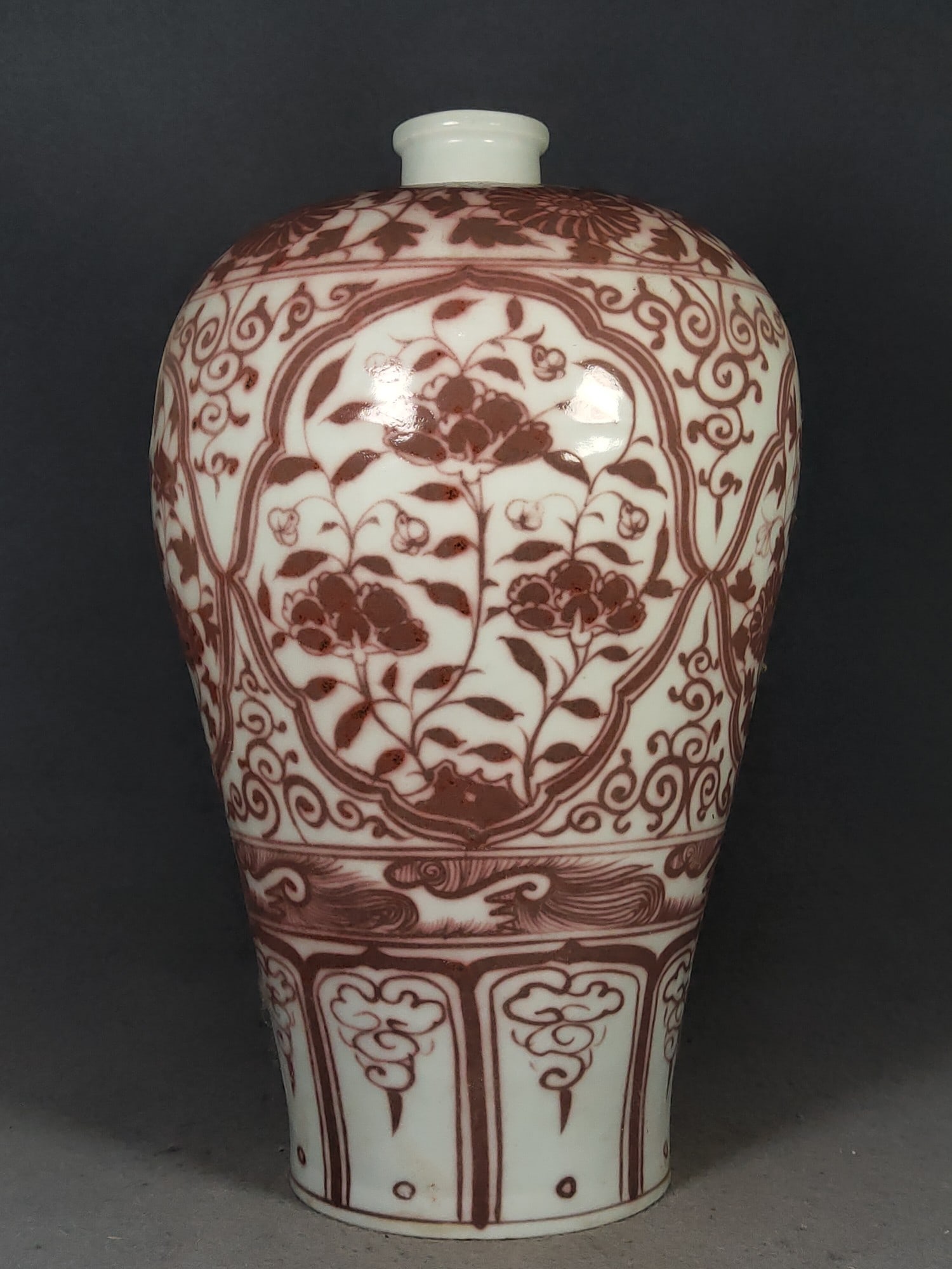 A large plum vase with underglaze red floral design from the Ming Dynasty. (1 of 7)