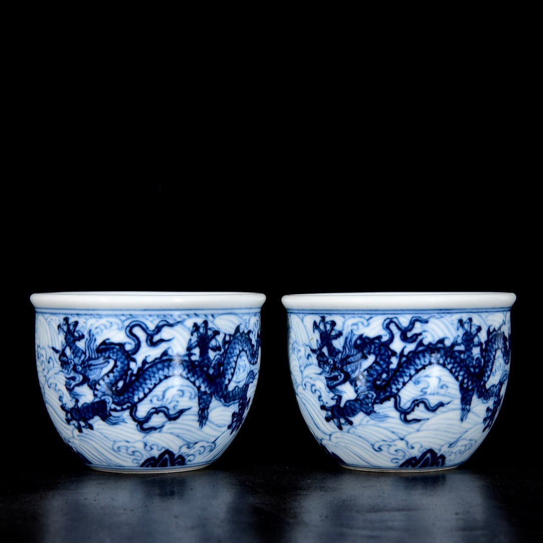 A pair of blue and white porcelain cups with sea dragon design from the Xuande period of the Ming (1 of 9)