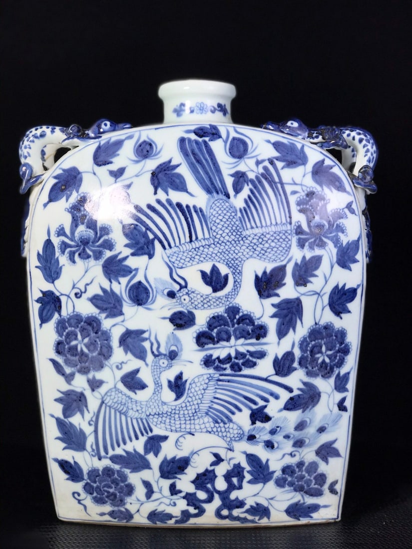 Blue and white phoenix four-handled flat bottle: A blue and white phoenix four-handled flat bottle, handmade, with a beautiful shape, upright and elegant form, and in excellent condition. Provenance:Private collection from a professor in Massachuset