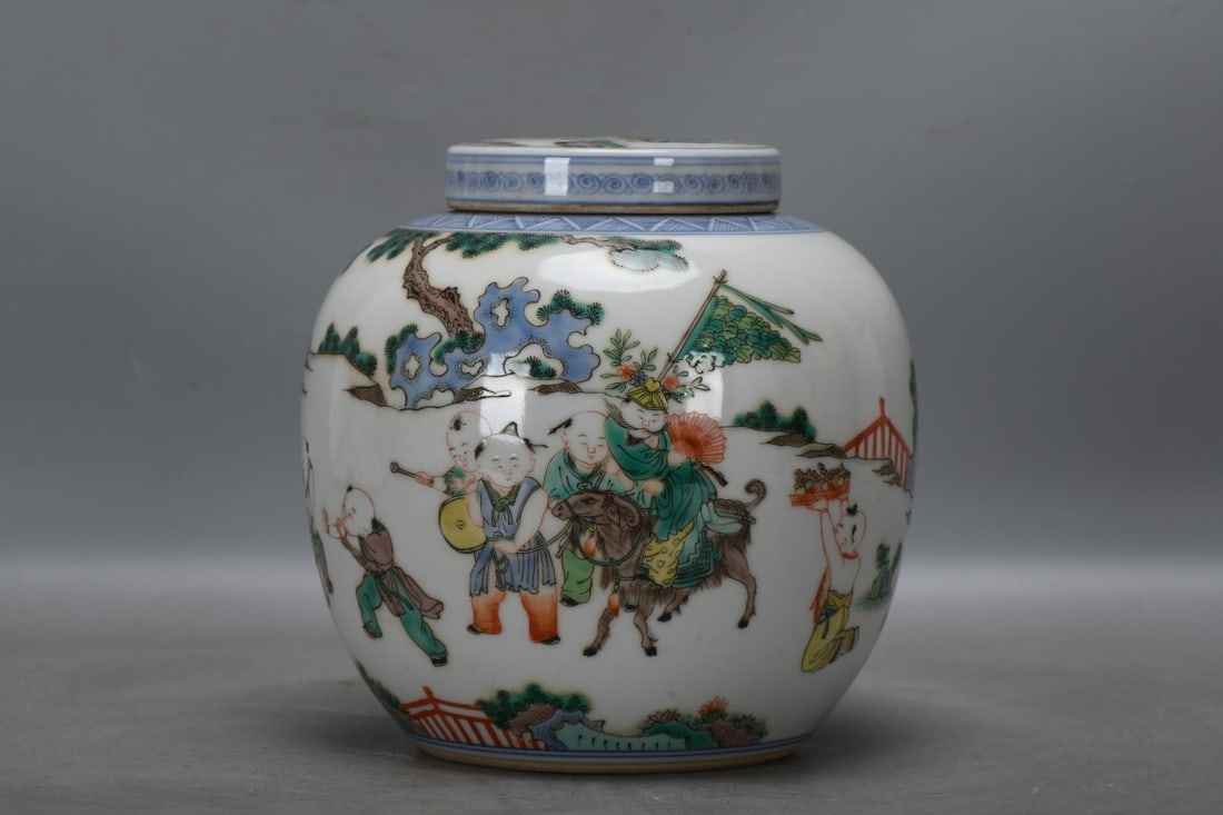 A Qing Dynasty, Kangxi period polychrome jar with a design of children at play. (1 of 8)