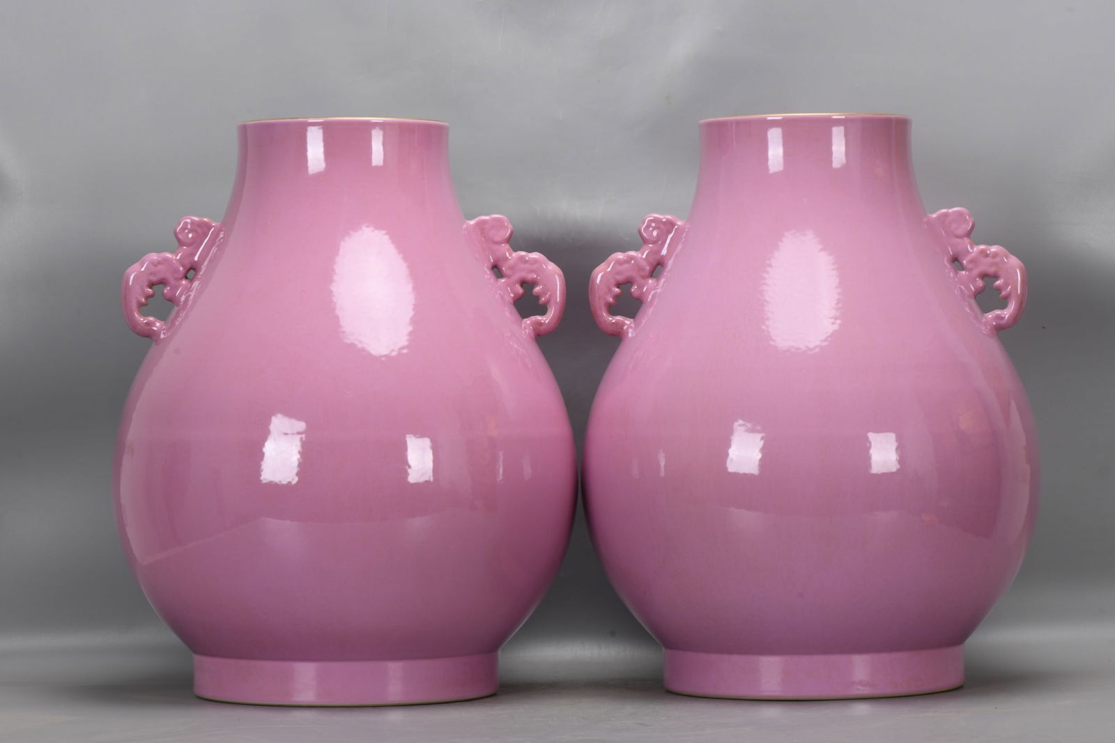 A pair of light pink lucky buckets from the Qing Dynasty, during the Yongzheng period.: A pair of light pink "Fu" buckets from the Qing Dynasty, during the Yongzheng period. They are 46.5 cm high, 17 cm in diameter at the mouth, 37.5 cm in diameter at the belly, and 25 cm in diameter at