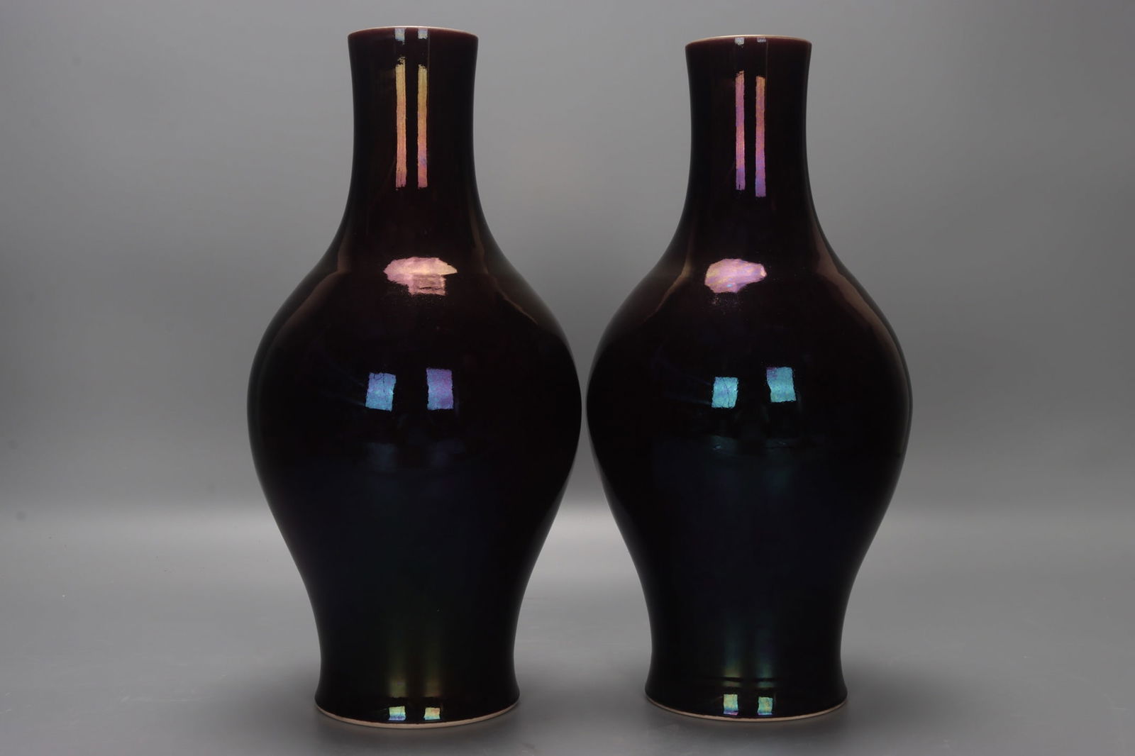 A pair of Qing Dynasty, Yongzheng period gemstone-purple glazed vases (1 of 9)