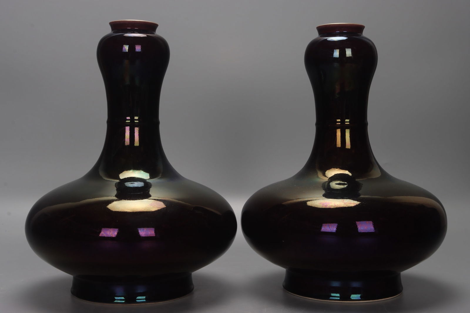A pair of Qing Dynasty, Yongzheng period, gemstone-purple-gold glazed garlic-head vases (1 of 9)