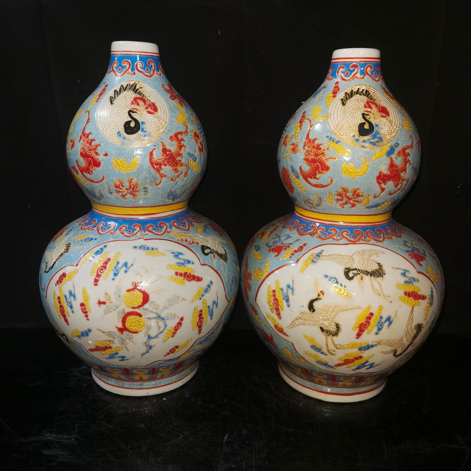 A pair of Qing Dynasty famille rose gourd-shaped vases (1 of 7)
