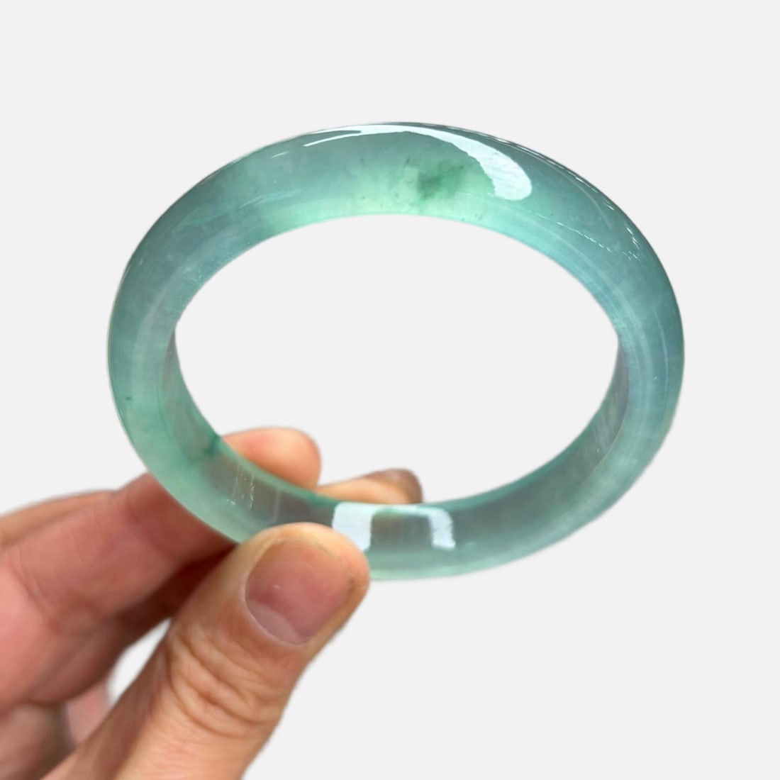 Blue Water Jadeite Bangle: Blue Water Jadeite Bangle Provenance:Private Estate, Honolulu, Hawaii. Our dedicated team expertly handles both domestic and global shipping arrangements.We also offer CONSOLIDATED SHIPPING for all go