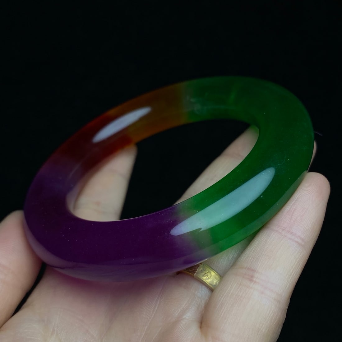 A jade bracelet treasured inside an embroidered jewelry box made during the Qianlong reign of the: A jade bracelet treasured inside an embroidered jewelry box made during the Qianlong reign of the Qing Dynasty. Provenance:Private Estate, Honolulu, Hawaii. Our dedicated team expertly handles both do