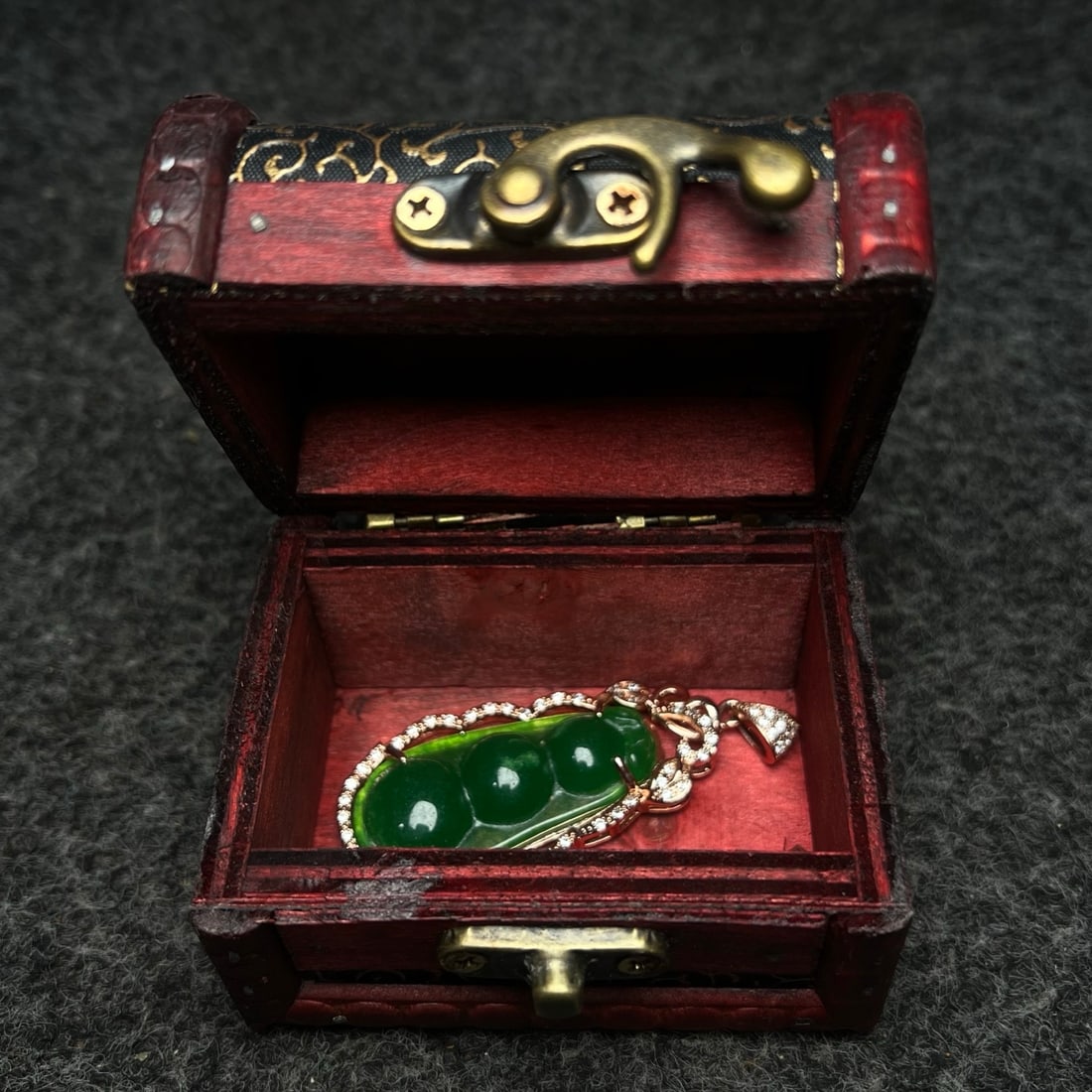 The classic treasure box contains a precious jade pendant. (1 of 9)