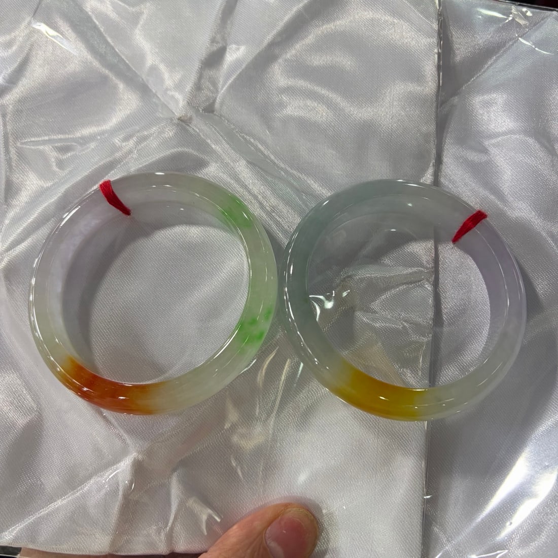 Tricolor Jadeite Bangle: Tricolor Jadeite Bangle Provenance:Mrs.Jennifer , Minneapolis, Minnesota. Collected by her late husband. Our dedicated team expertly handles both domestic and global shipping arrangements.We also offe