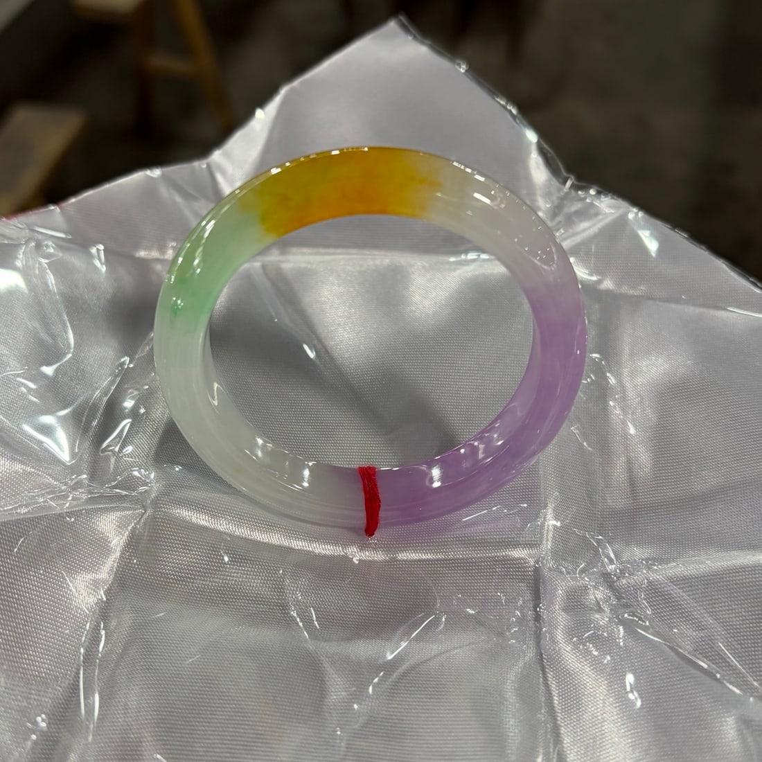 Tricolor jadeite bangle: Tricolor jadeite bangle Provenance:Mr. Stefan, Minneapolis, Minnesota. Our dedicated team expertly handles both domestic and global shipping arrangements.We also offer CONSOLIDATED SHIPPING for all go