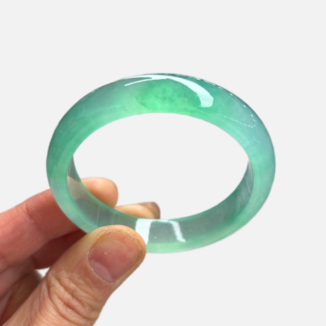 Burmese jadeite bangle, high-grade icy jadeite, light green lake green, small mouth. (1 of 10)