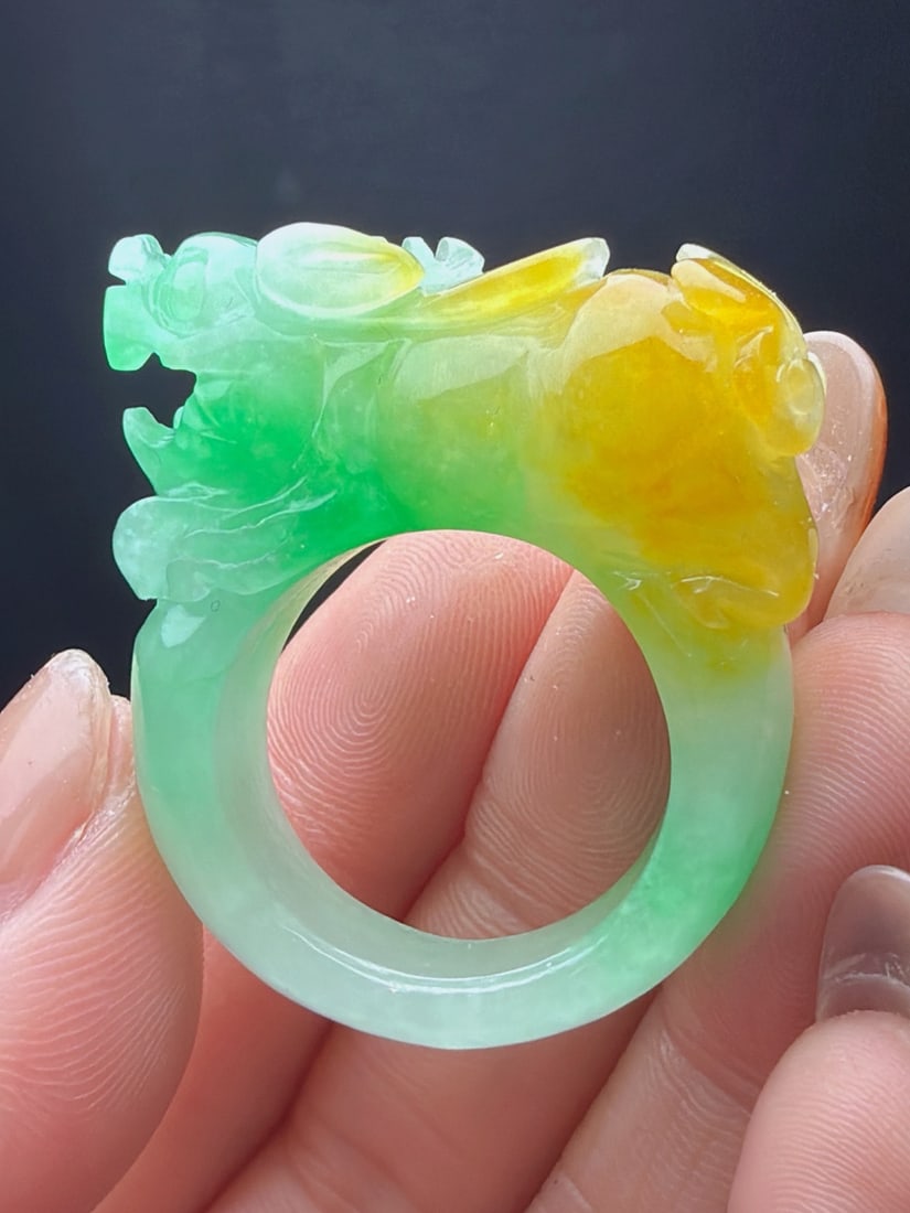 Jadeite thumb ring with yellow and green hues. (1 of 8)