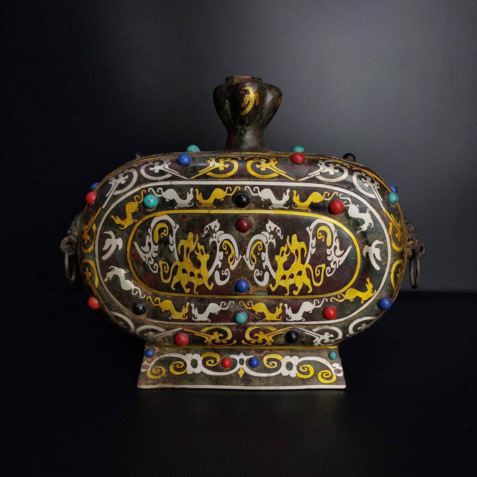 Warring States Period Bronze - Flat Bottle Inlaid with Gold, Silver and Gemstones: Warring States Period Bronze Flat Bottle Inlaid with Gold, Silver, and Gemstones Height: 19cm Width: 22cm Weight: 1375g Provenance:Mrs.Jennifer , Minneapolis, Minnesota. Collected by her late husband.