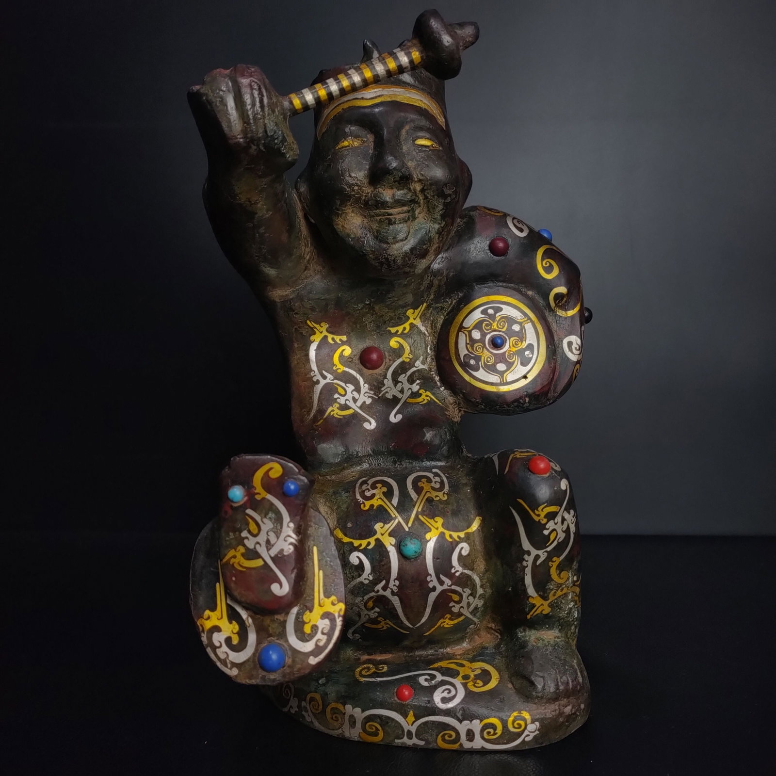 Warring States Period Bronze Drummer Inlaid with Gold, Silver and Gemstones: Warring States Period Bronze Drummer Figure Inlaid with Gold, Silver, and Gemstones Height: 26cm Width: 14cm Weight: 2.7kg Provenance:Mrs.Jennifer , Minneapolis, Minnesota. Collected by her late husba