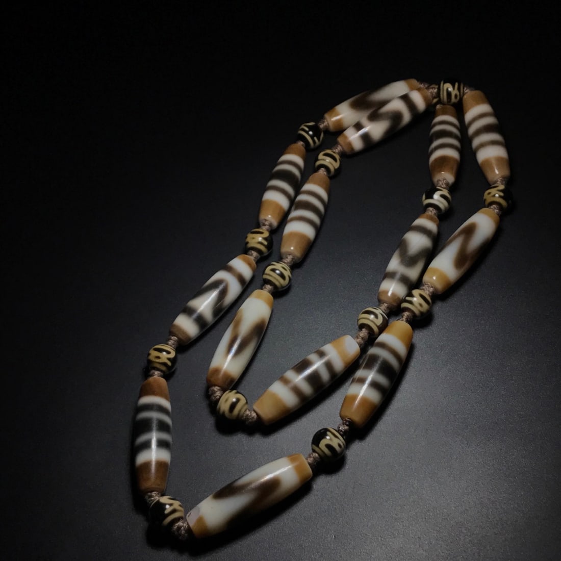 Fine-patinaed antique agate dzi bead multi-gemstone necklace handheld (1 of 9)