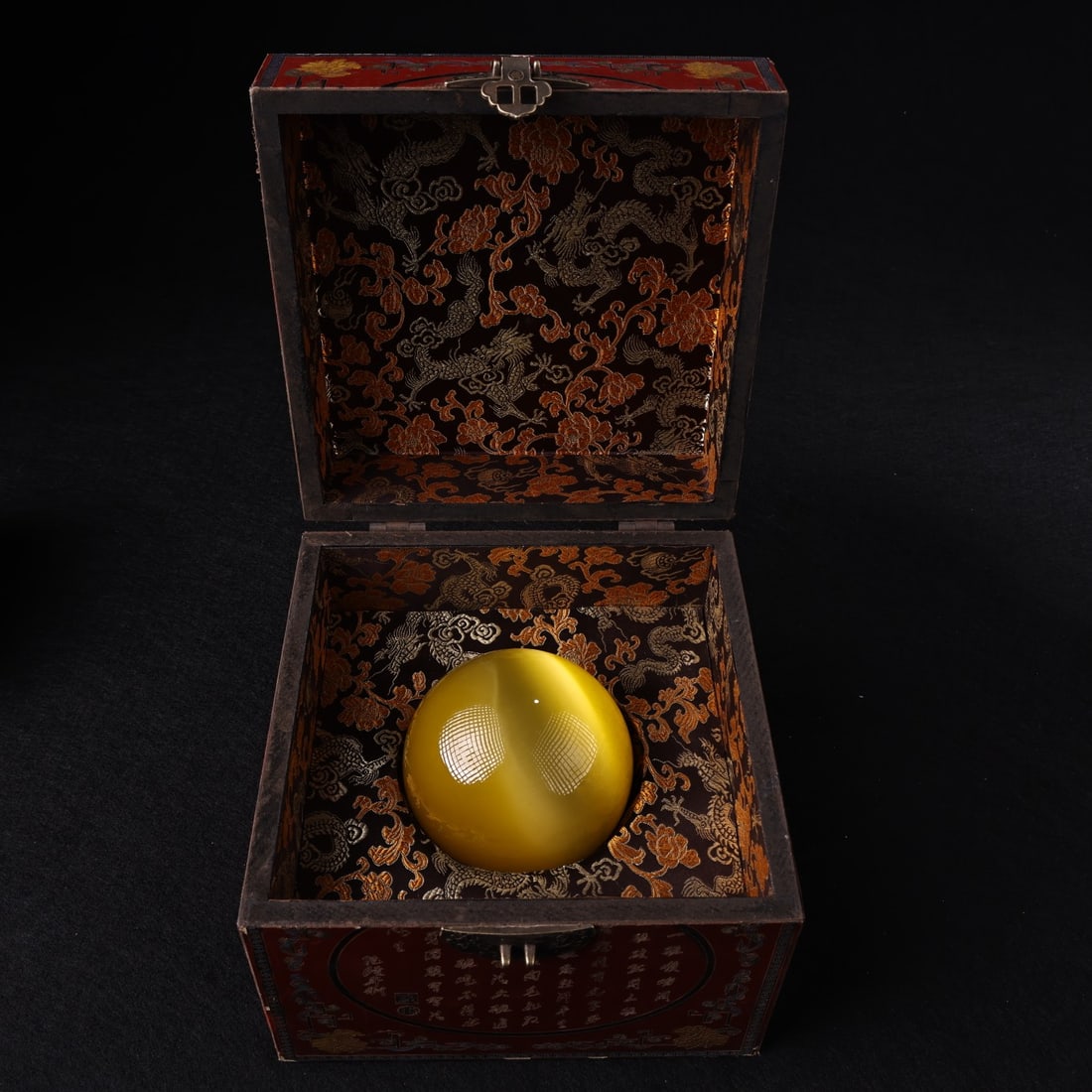 Rare and exceptionally large yellow cat's eye stone sphere acquired during a trip to the countryside (1 of 9)