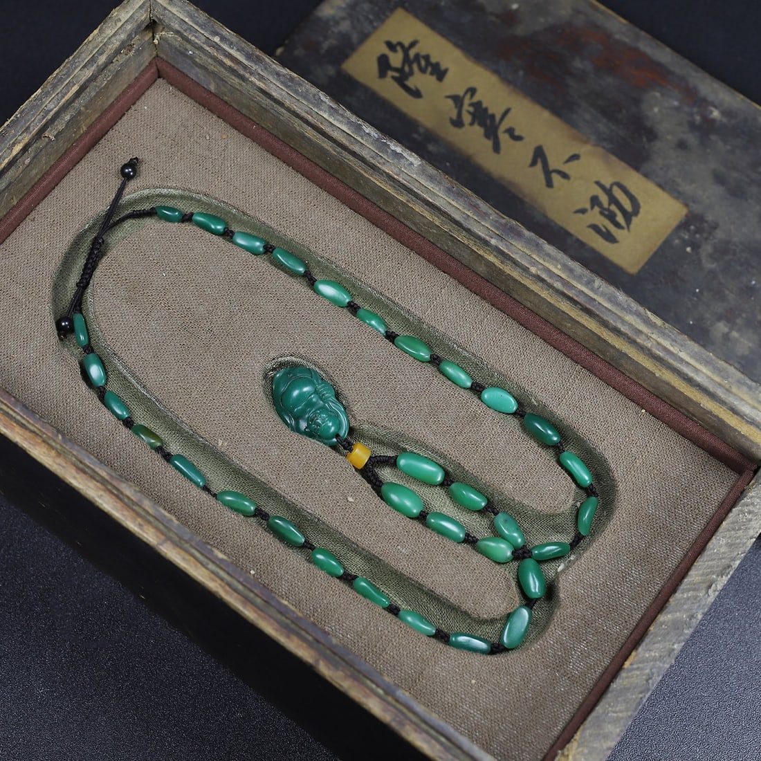 Old Collection Shoushan Stone Cloth Bag Maitreya Buddha Pendant Necklace: Formerly owned Shoushan stone Maitreya Buddha pendant necklace. The pendant is 3.5 cm long, 2 cm wide, and 1 cm thick. The necklace weighs 37 g. Provenance:Private collection from a professor in Harva