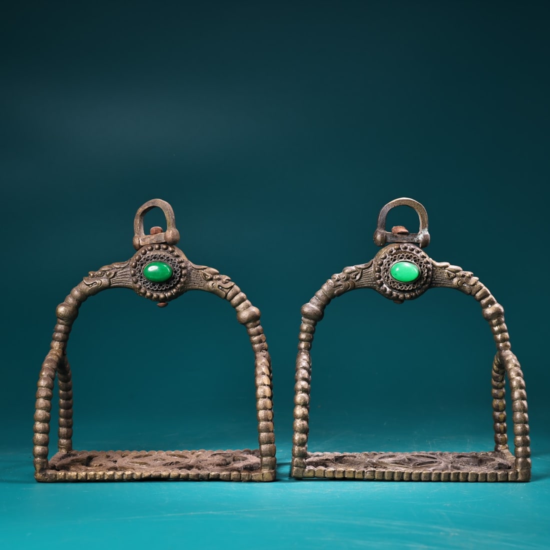 Collect a pair of antique pure copper, handcrafted, and gem-encrusted horse stirrups. (1 of 9)