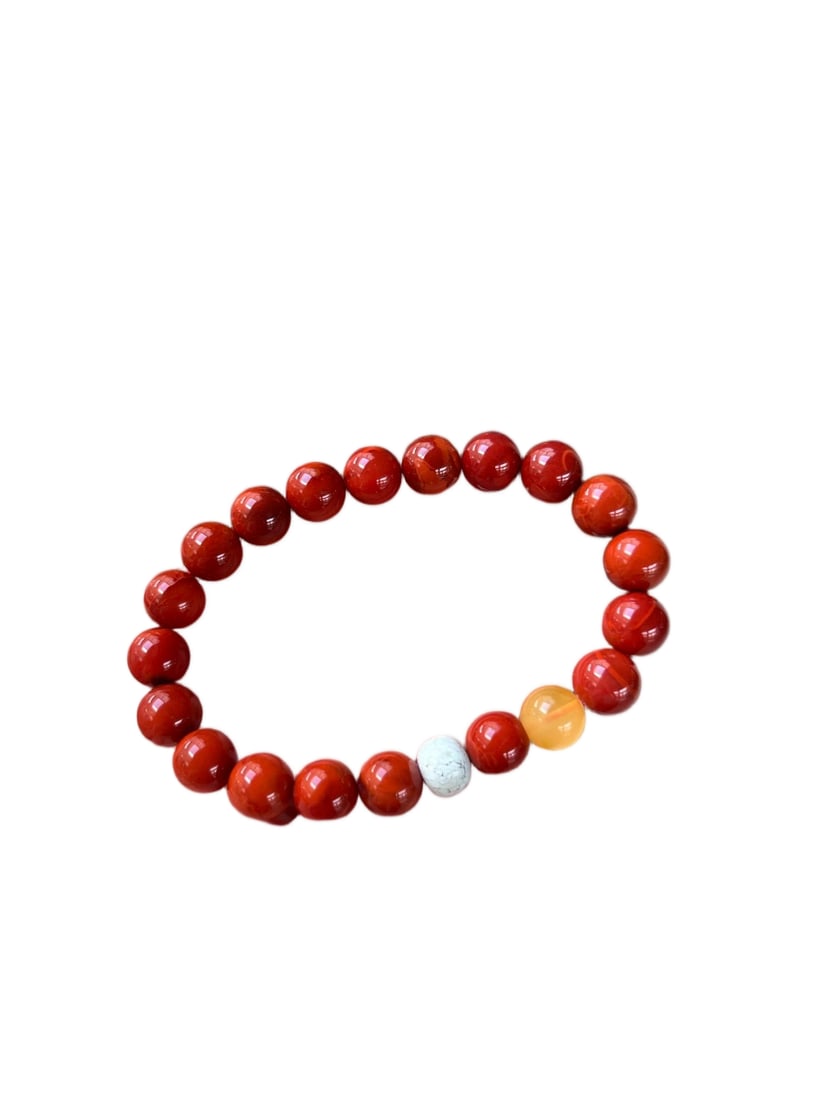 Natural Wasi material Southern Red Agate Ox Blood Red Single-Strand Bracelet: Natural Wasi agate, blood red, single-strand bracelet with turquoise and amber. Fine texture and excellent jade quality. Size: 9mm. Total weight: 21.1g. Provenance:Private Estate, Honolulu, Hawaii. Ou