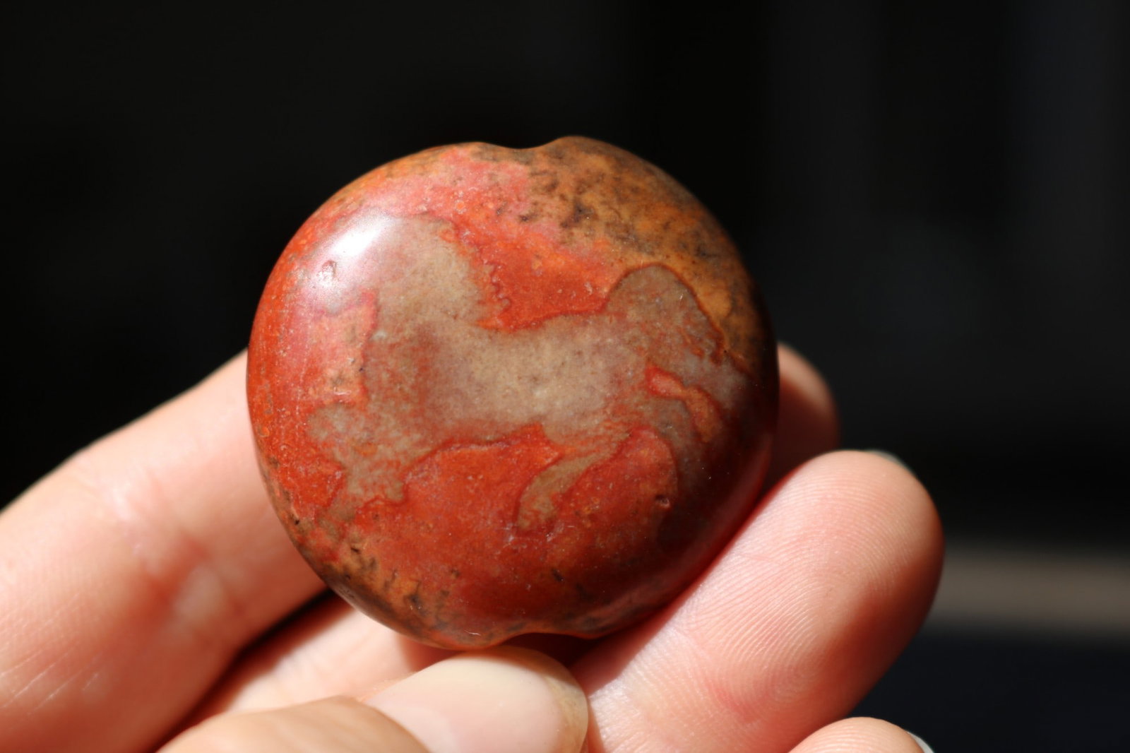 A six-eyed antique dzi bead symbolizing "Success Upon Arrival". (1 of 9)