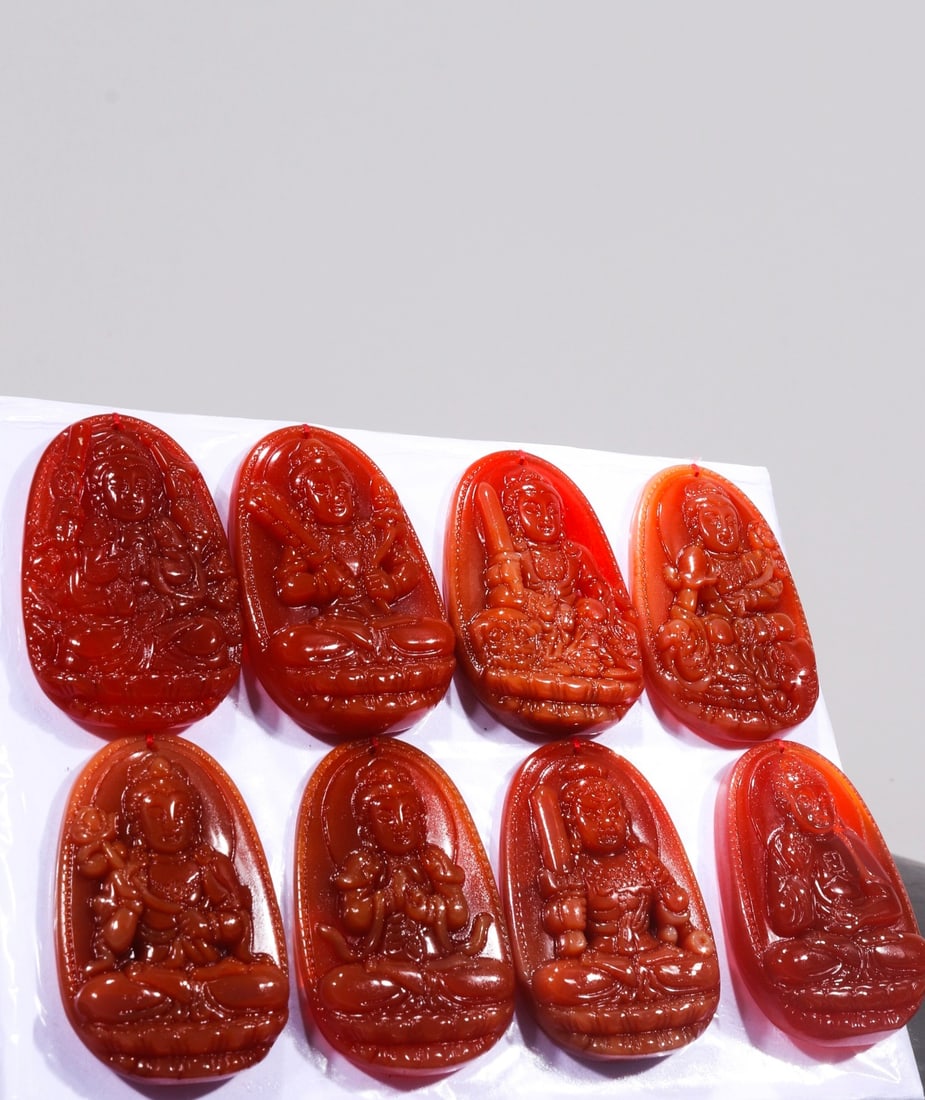 A set of exquisite hand-carved agate pendants depicting eight guardian deities, from a collection of (1 of 6)