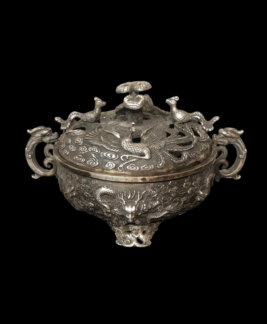 Silver Double-Eared, Three-Legged, Hollowed-Out Dragon and Phoenix Incense Burner with Lingzhi: A cloisonne enamel vase with a copper body, 36cm high, approximately 20cm in diameter, with a mouth diameter of 11.5cm, and weighing 1011 grams. Provenance:Mrs. Amily, Washington, DC. Our dedicated te